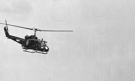 A UH-1B of HA(L)-3 flying over PCF-40 in Vietnam